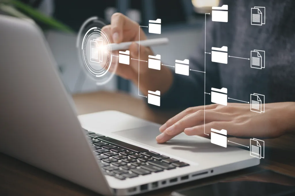 Businessman,Using,A,Computer,To,Document,Management,Concept,,Online,Documentation File storage software solution